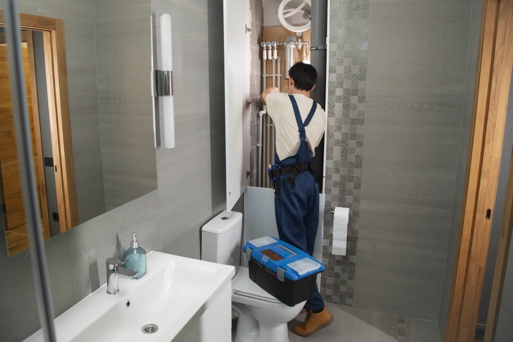 male-plumber-working-fix-problems-client-s-house__1_